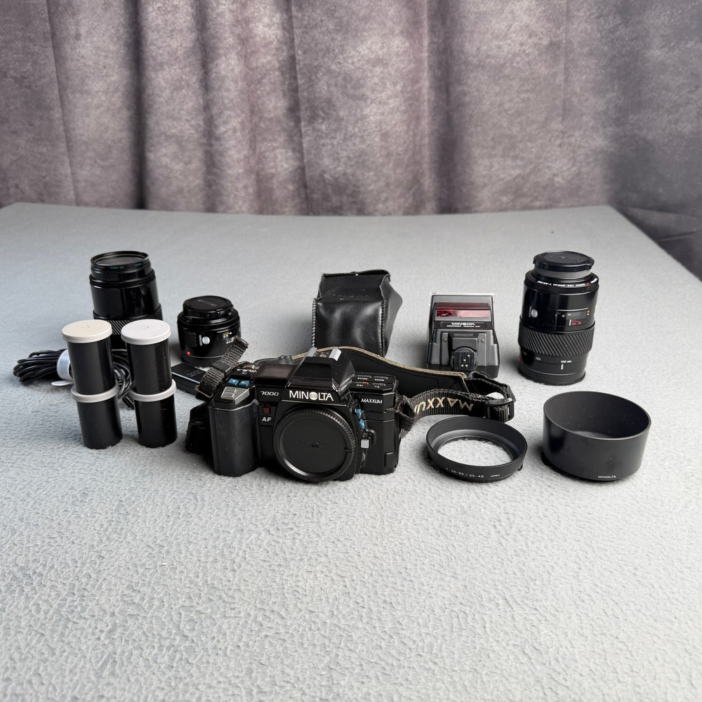 Minolta Maxxum 7000 AF 35mm SLR Film Camera Bundle 3 Lenses Flash 4 Rolls Film
